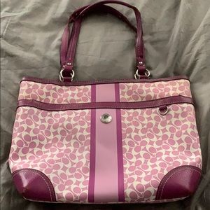 Signature coach in playful pink and white satchel